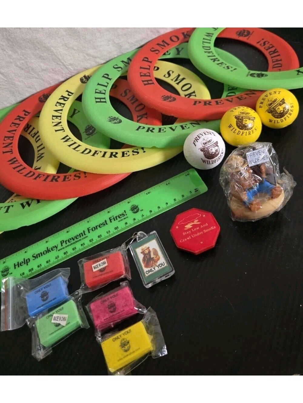 Lot Vintage Smokey The Bear Advertising Frisbees Keychains Spinner Erasers More